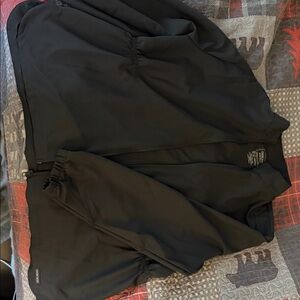 Women's dark grey Cherokee workwear scrub jacket
